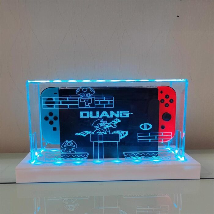 Nintendo gaming console illuminated dust cover